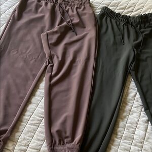 Two Athleta Women's trouser/joggers in Mauve and green. Great condition. Size 6.